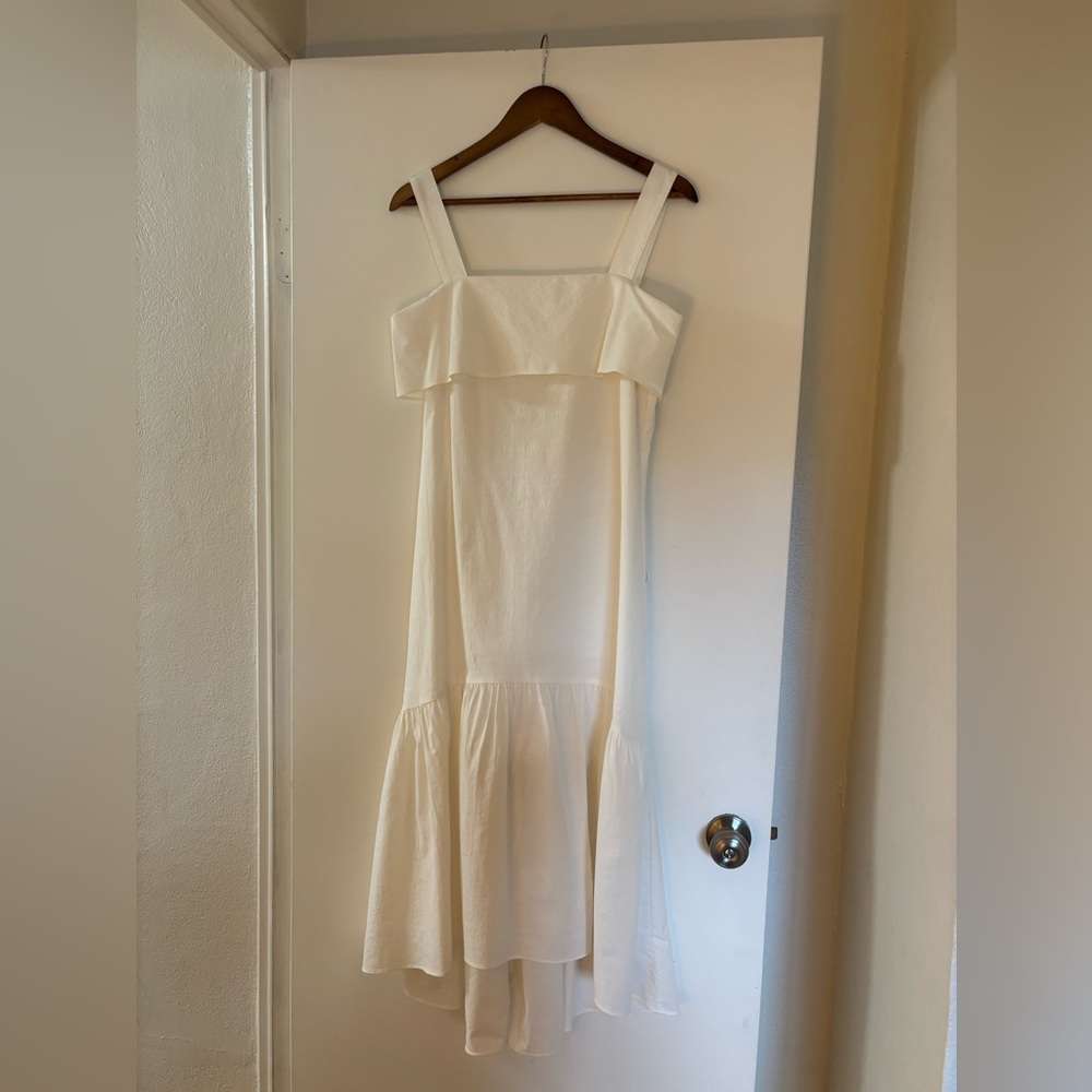 Pink Moon Bay white linen dress.